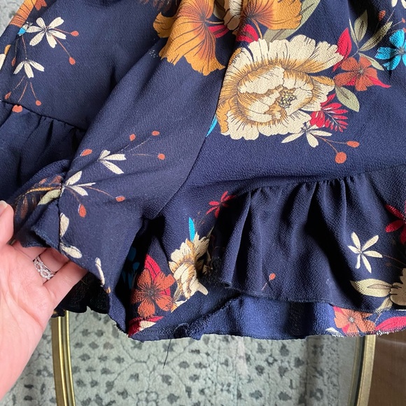 Floral Summer Romper with Ruffle bottom and Criss cross back - Picture 3 of 8